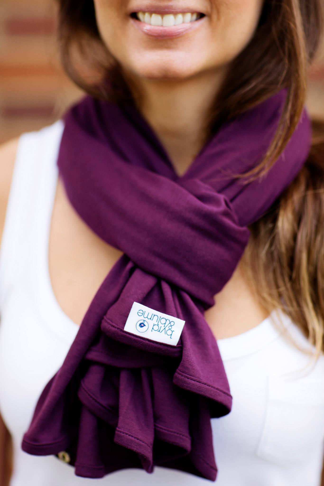 Fashionable nursing cover worn as a scarf – lightweight, stylish, and practical for daily use.