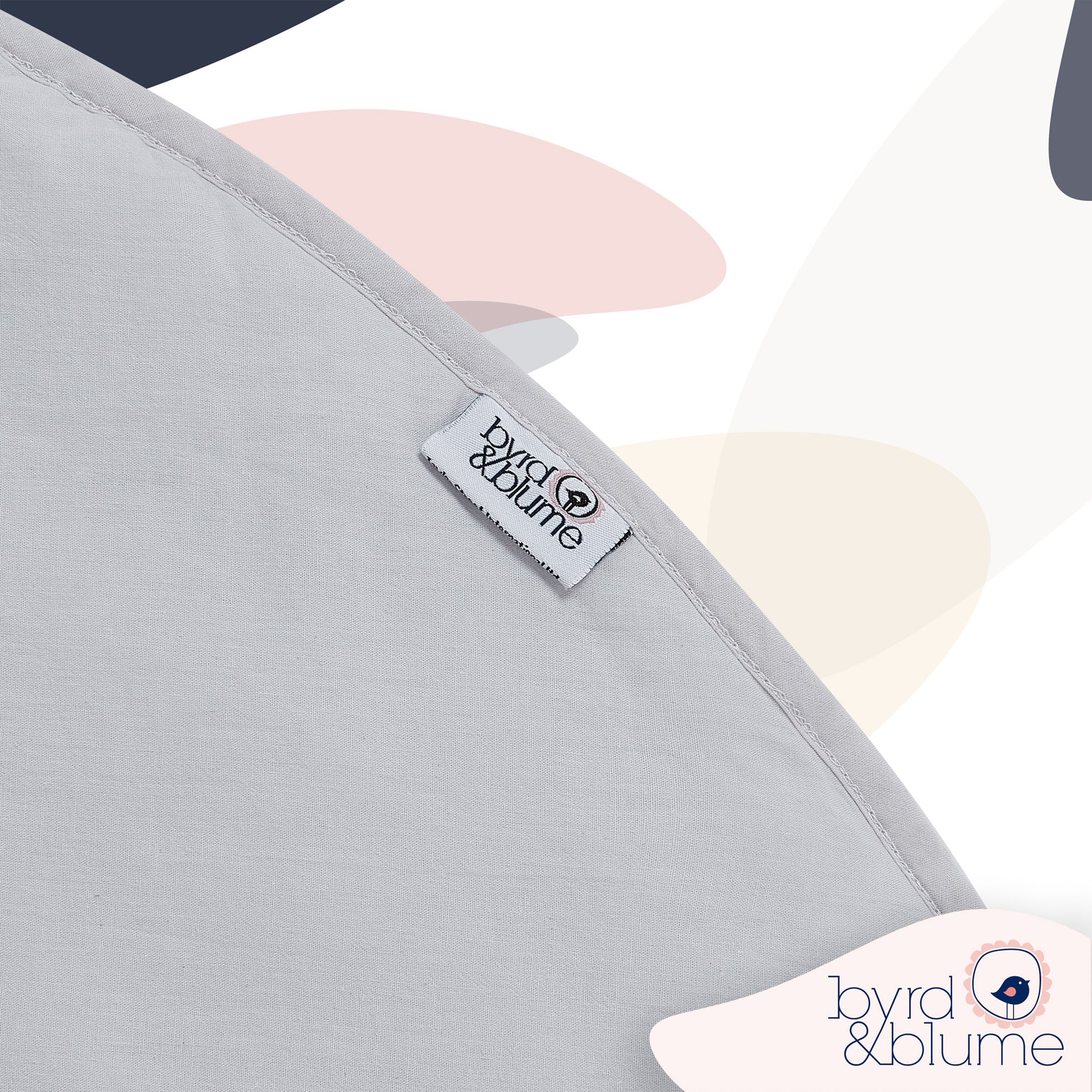 Reversible organic cotton baby playmat showing minimalist design and soft padded comfort for infants.