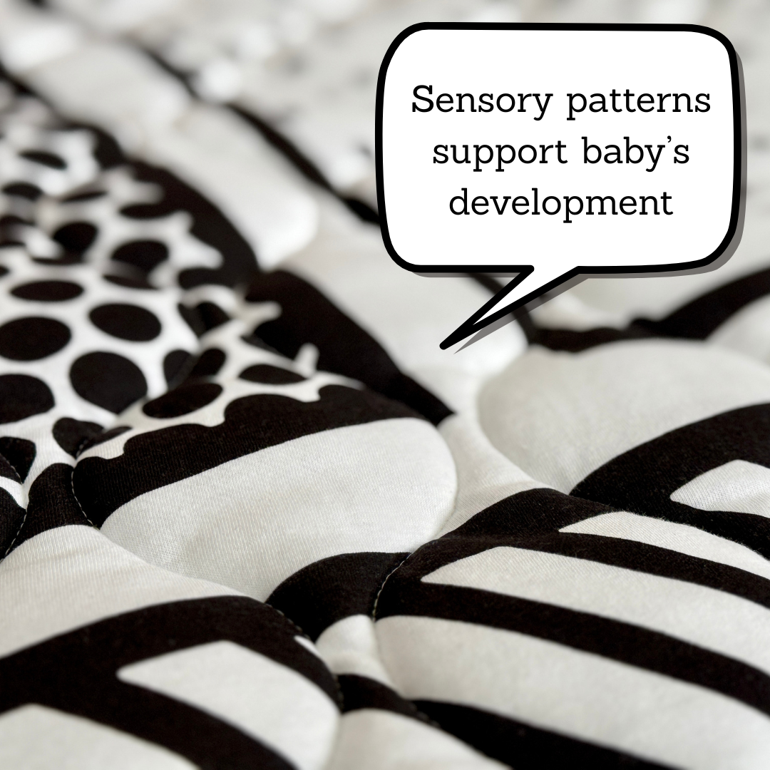 Text bubble with 'Sensory patterns support baby's development' over a textured black and white patterned fabric.